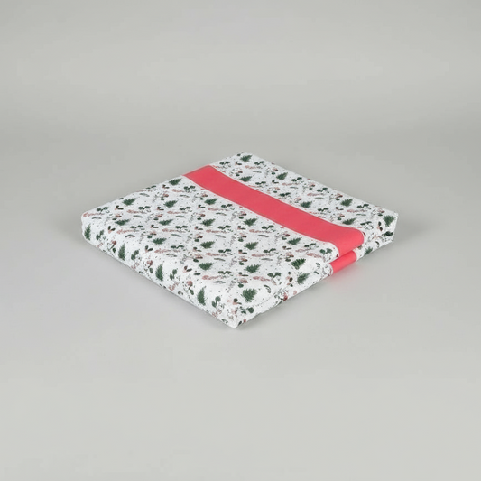 Floral-patterned fabric with a red strip on a gray background